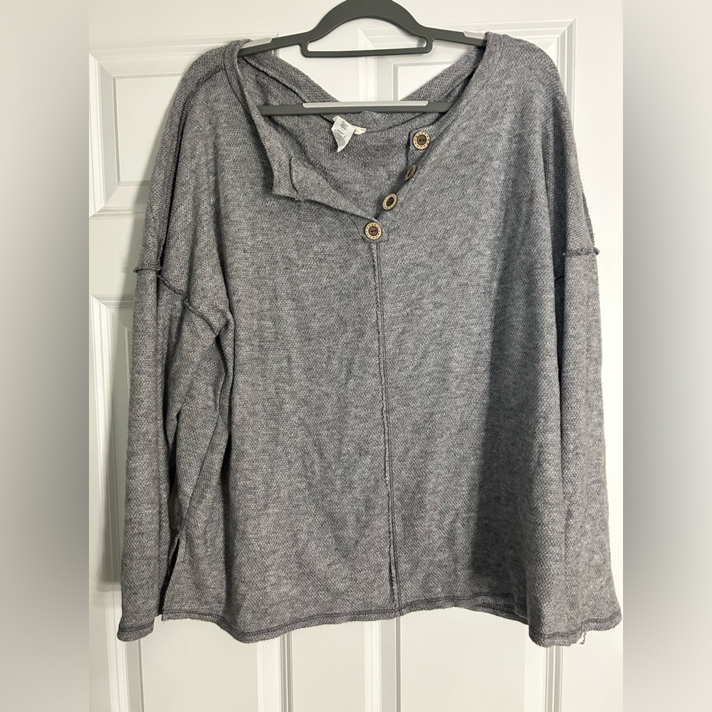 Long sleeve, four wooden buttons, size extra large, boutique purchased.